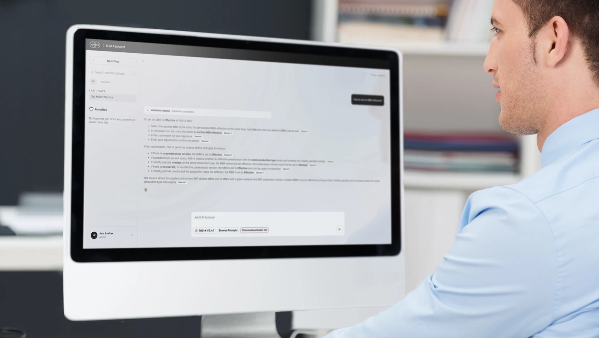 Man using Körber's K.AI Assistant on the computer. 