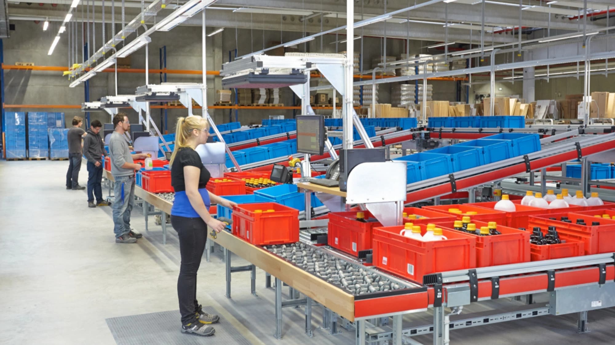 a woman handling dangerous goods inside a warehouse