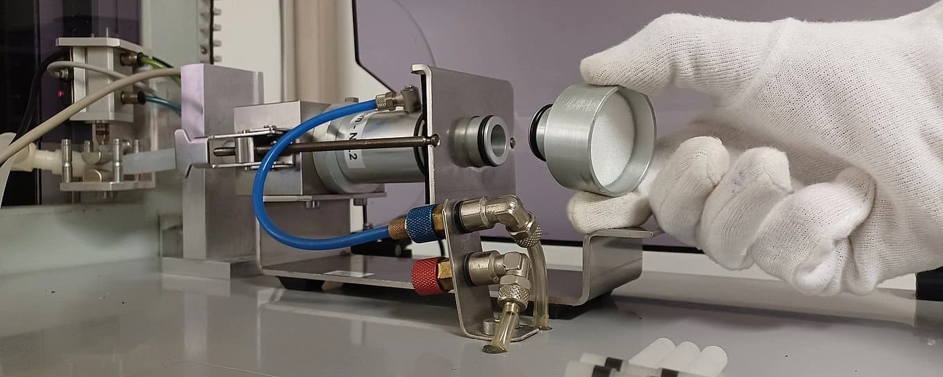 Hand calibrating a machine.