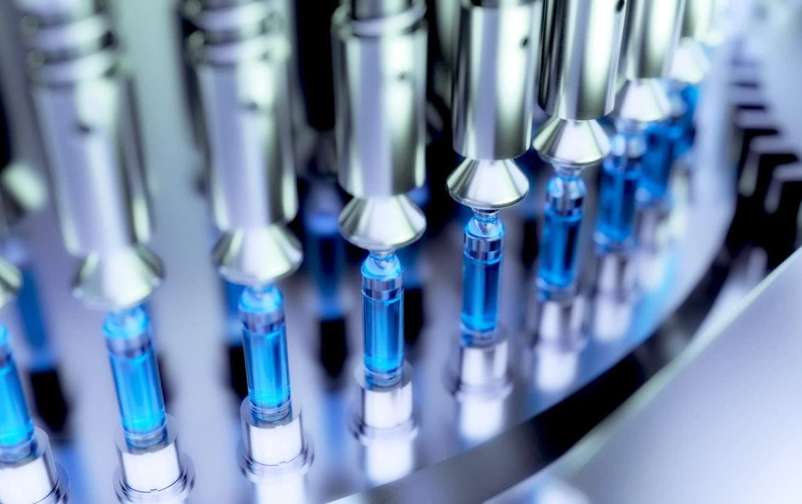 Close-up of a machine featuring multiple needles