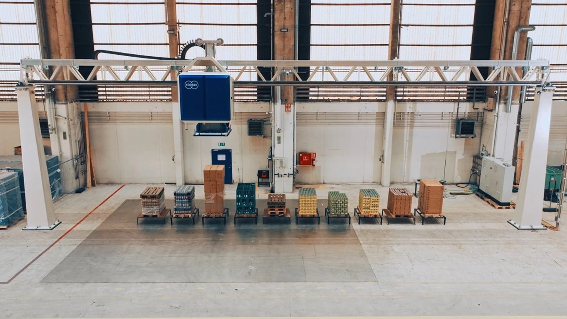 Körber layer picker machine working inside an efficient logistics center.
