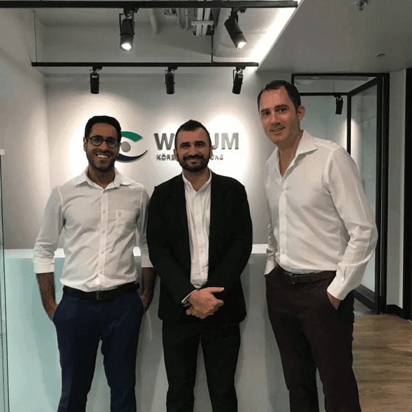 Körber and Emad employees after closing the partnership