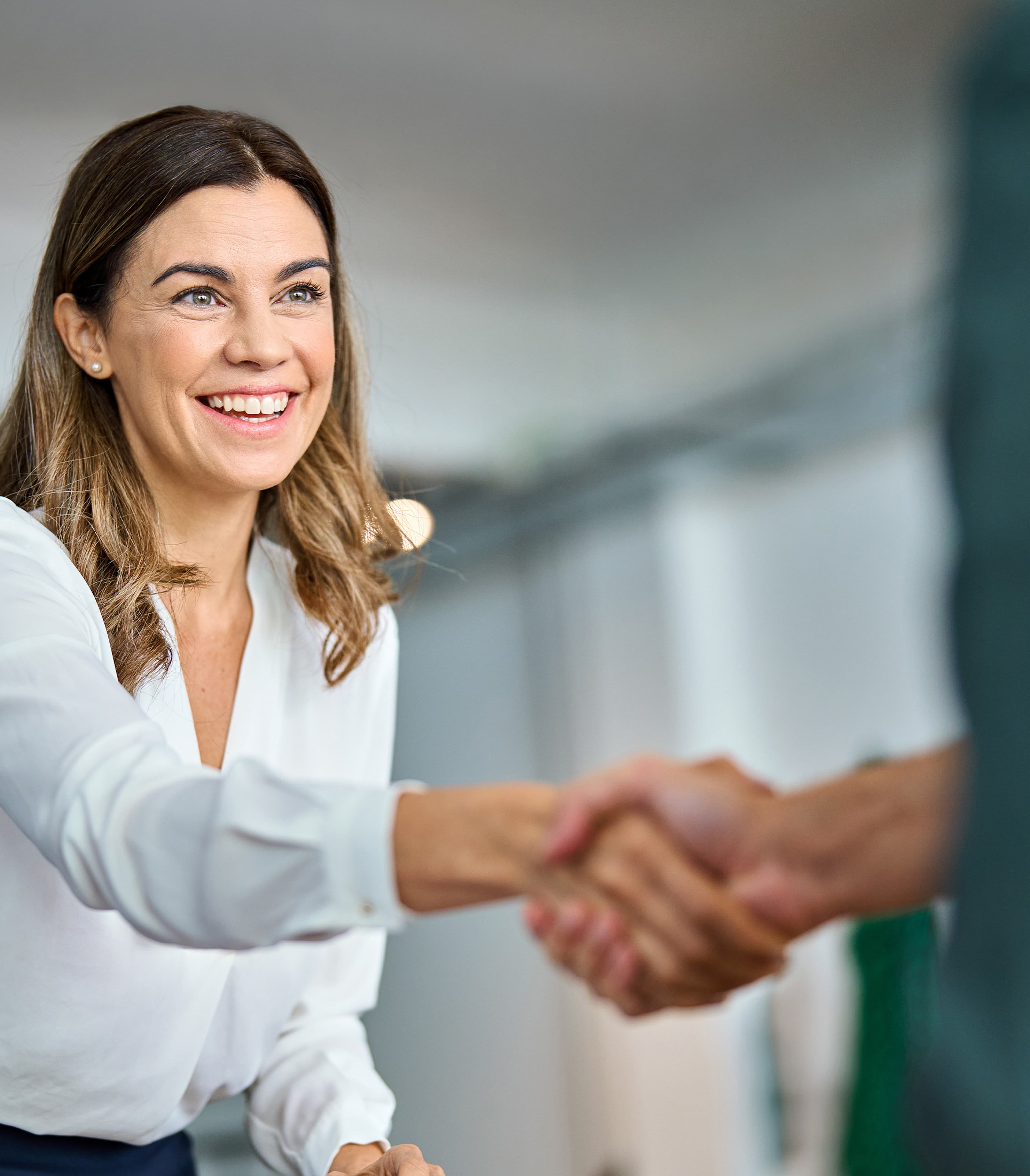 Woman shaking hands with someone