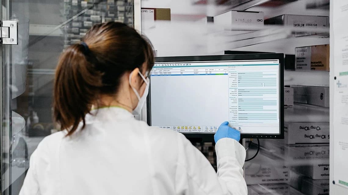 a woman working on steplogic product suite