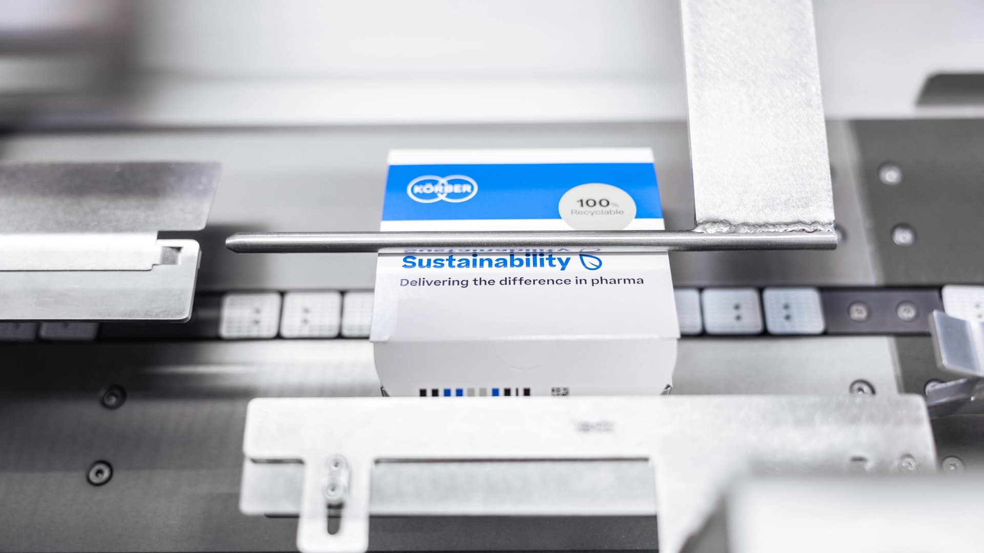 Small package box with the word Sustainability and Körber's logo.
