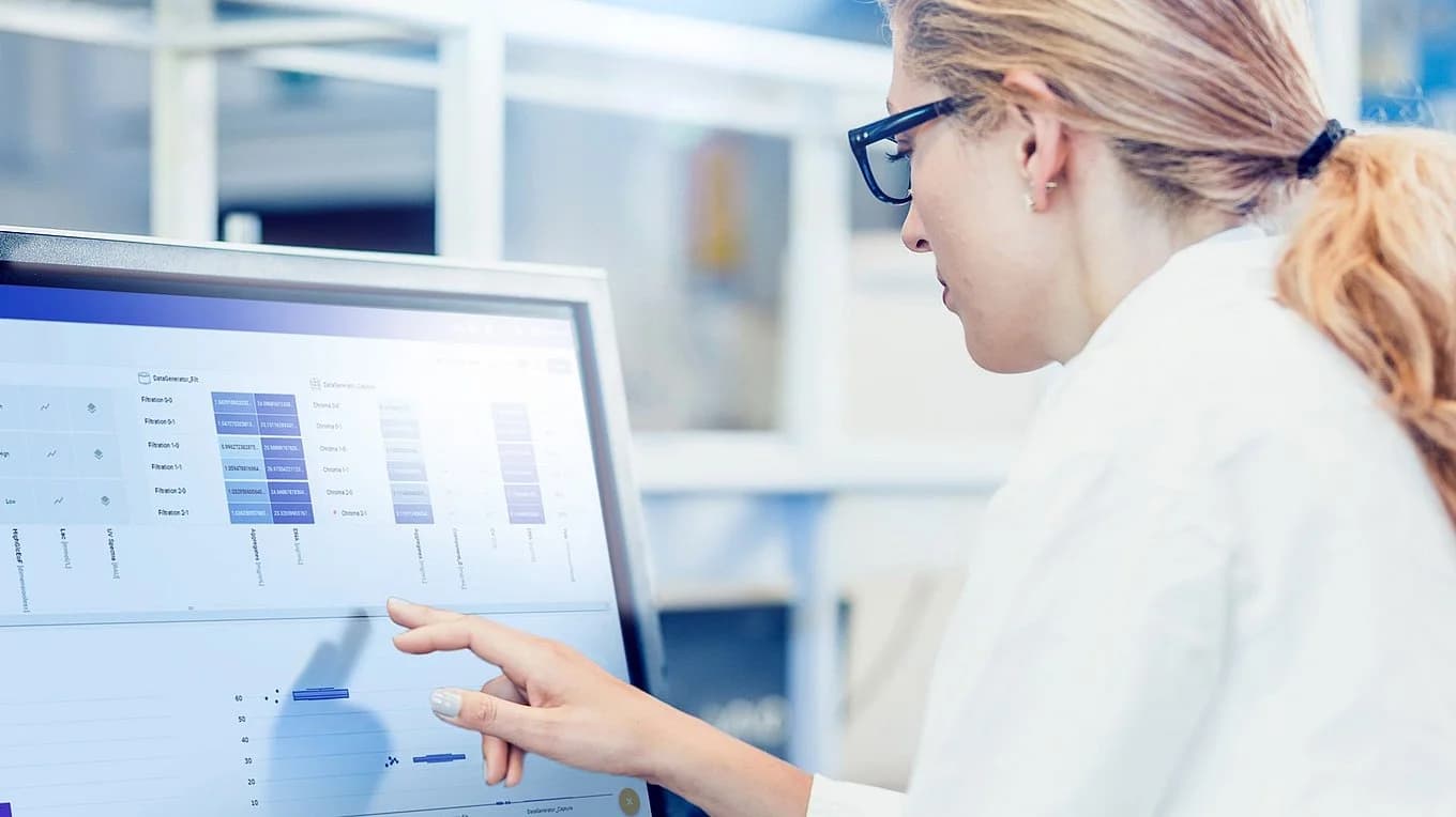 a woman focused on analysing data