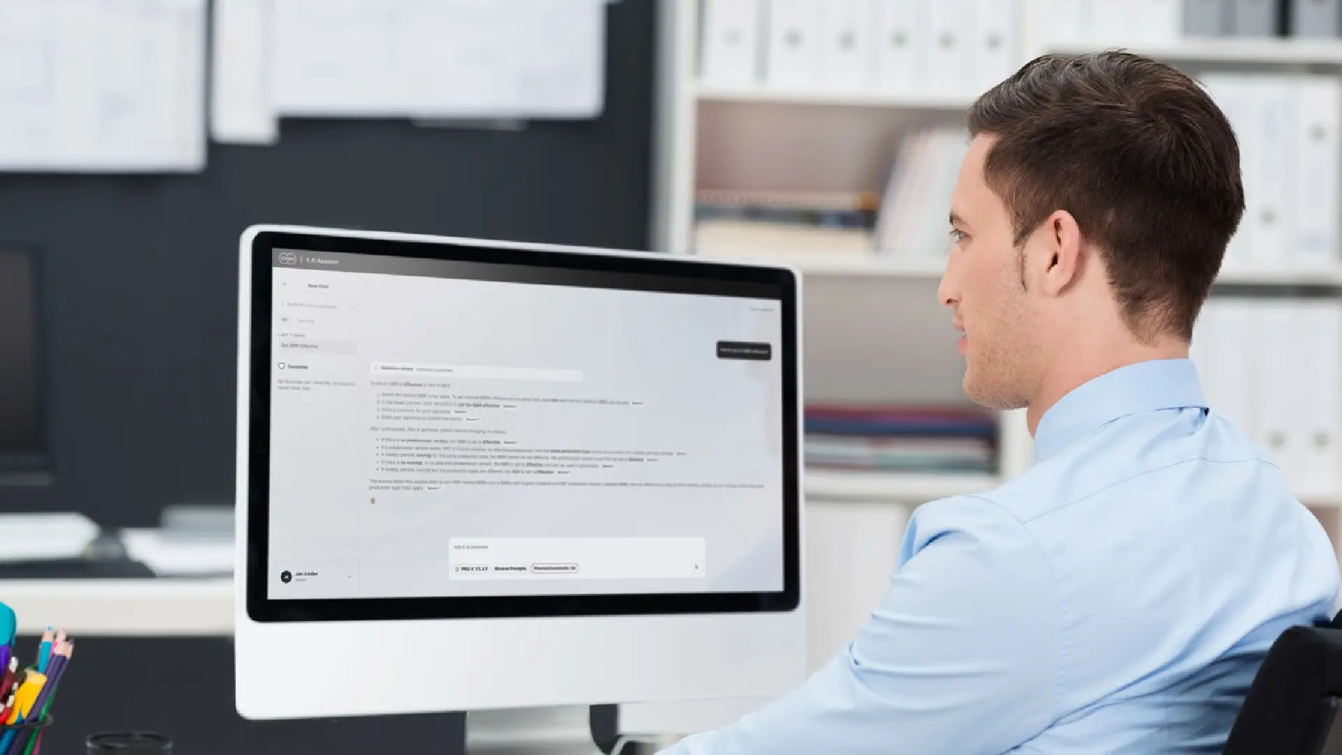 Man using Körber's K.AI Assistant on the computer.