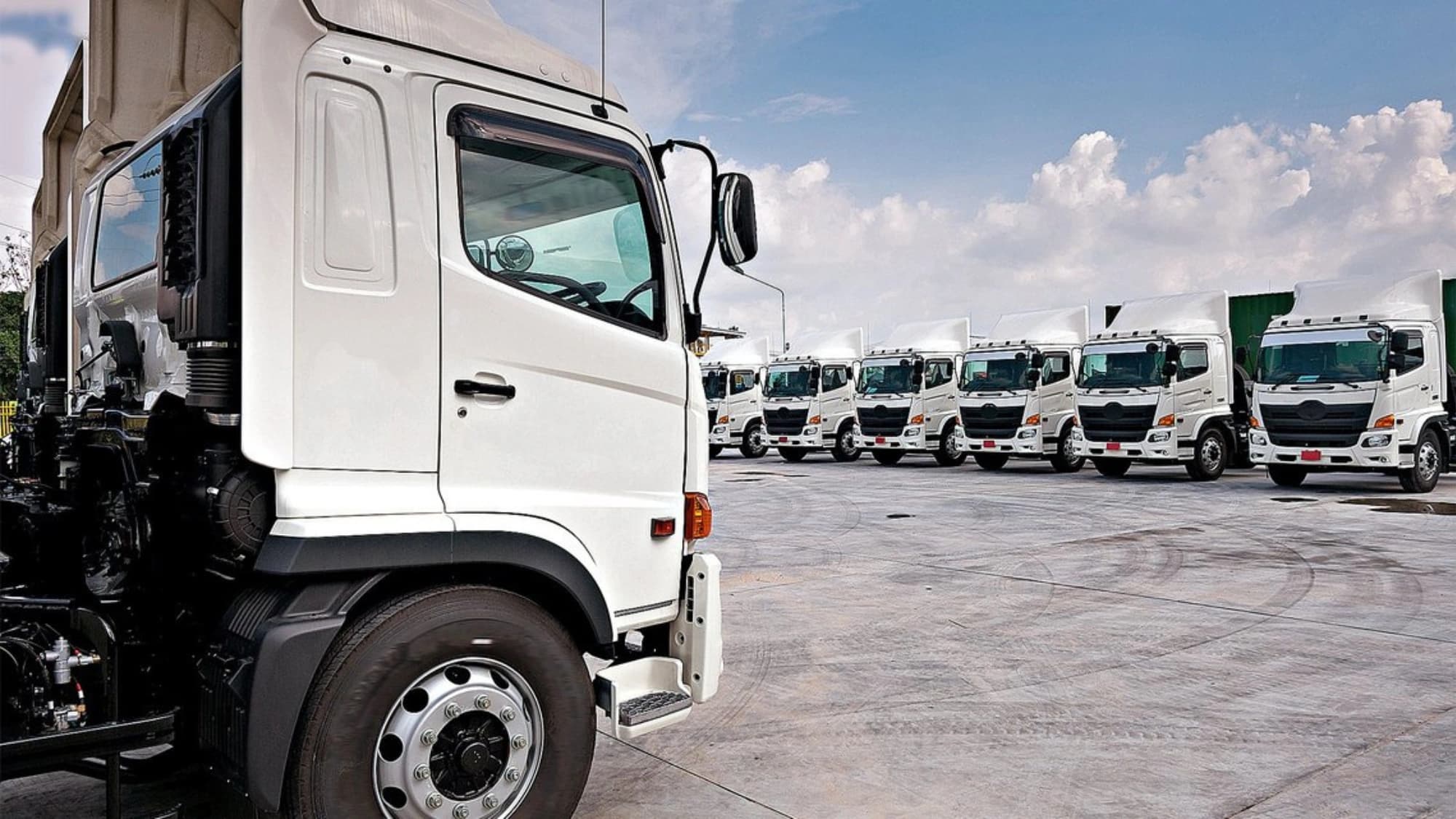 a parking lot full of trucks