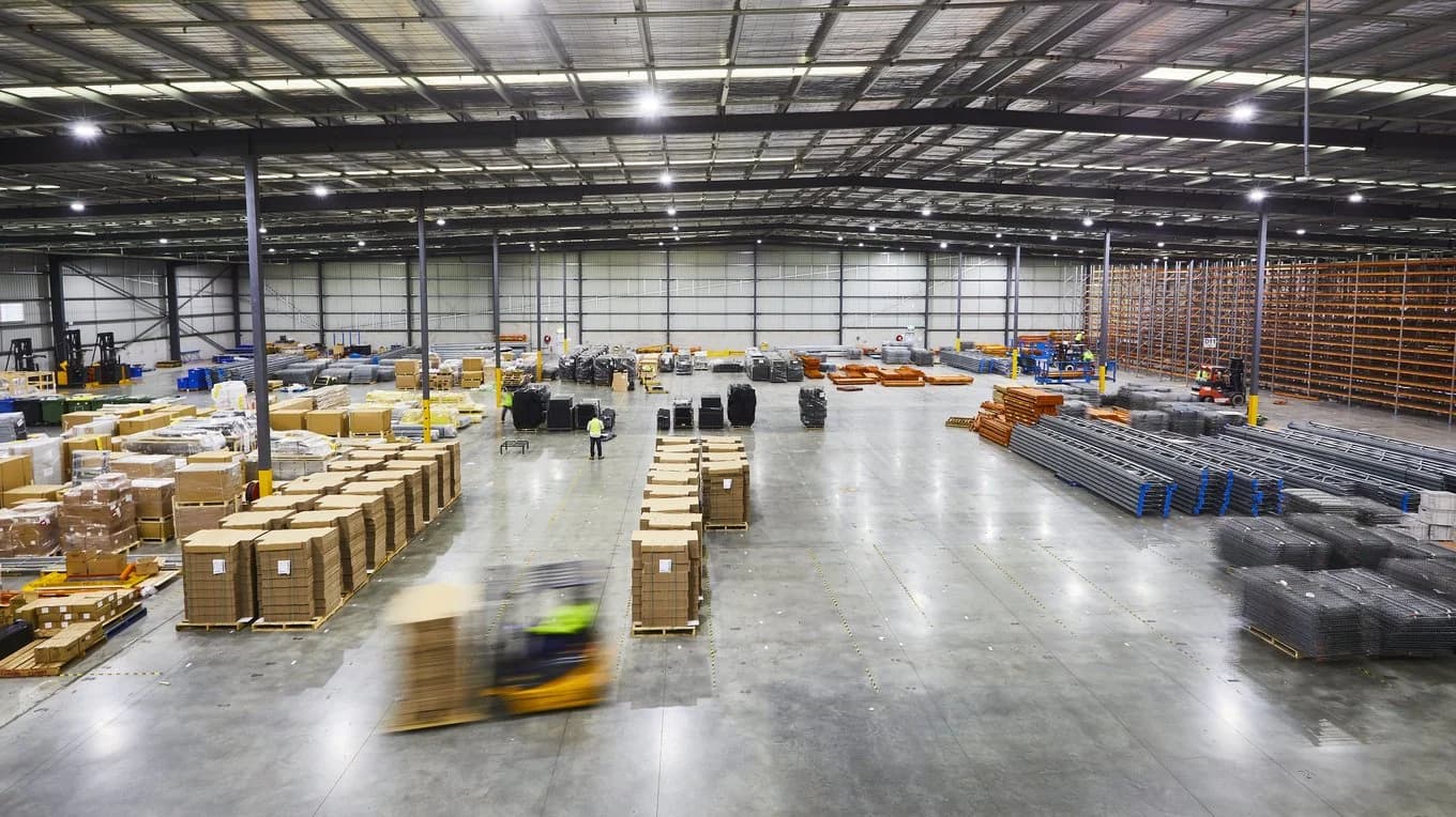 Picture of the day-to-day operations of a big warehouse.